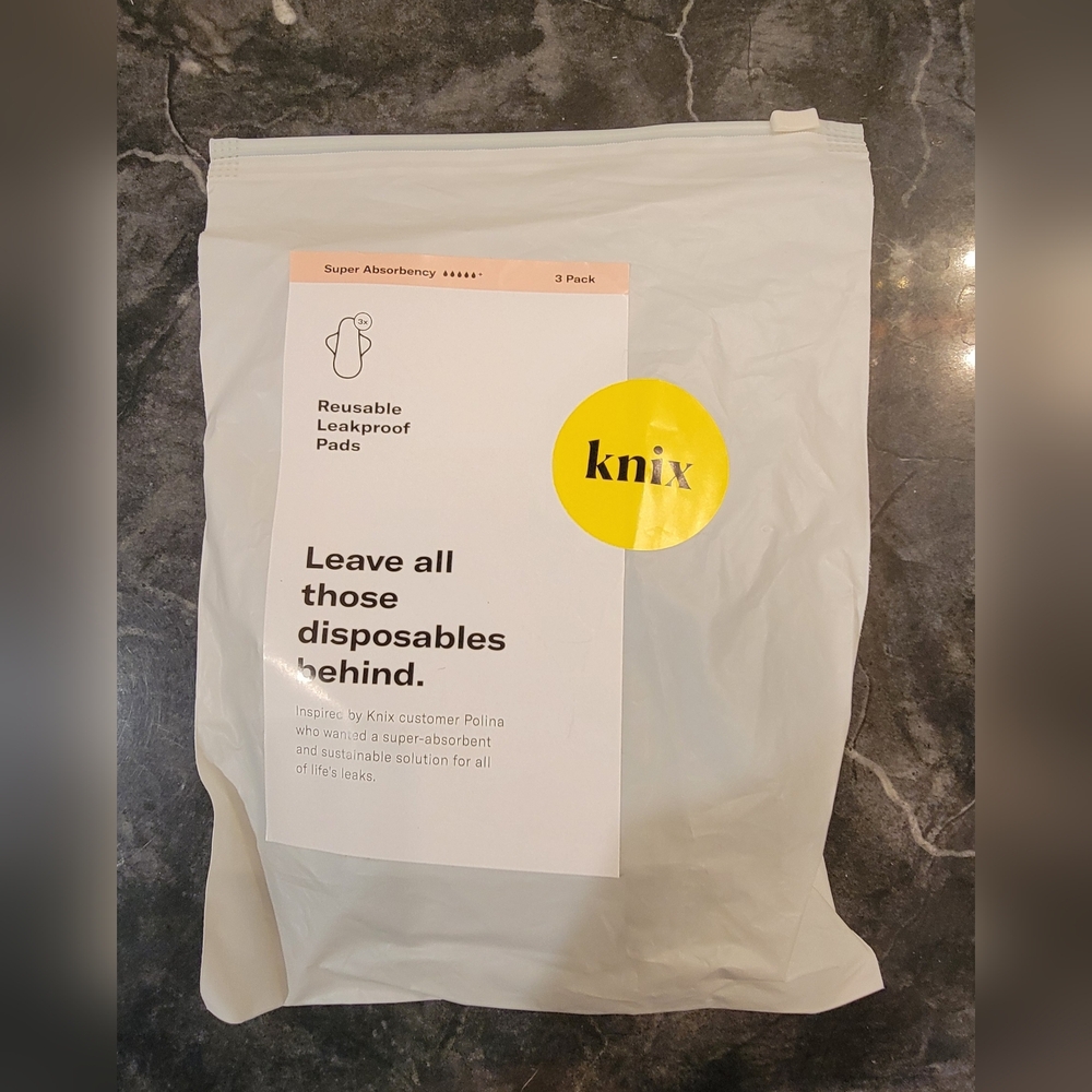 Knix Leakproof Pads in White Packaging